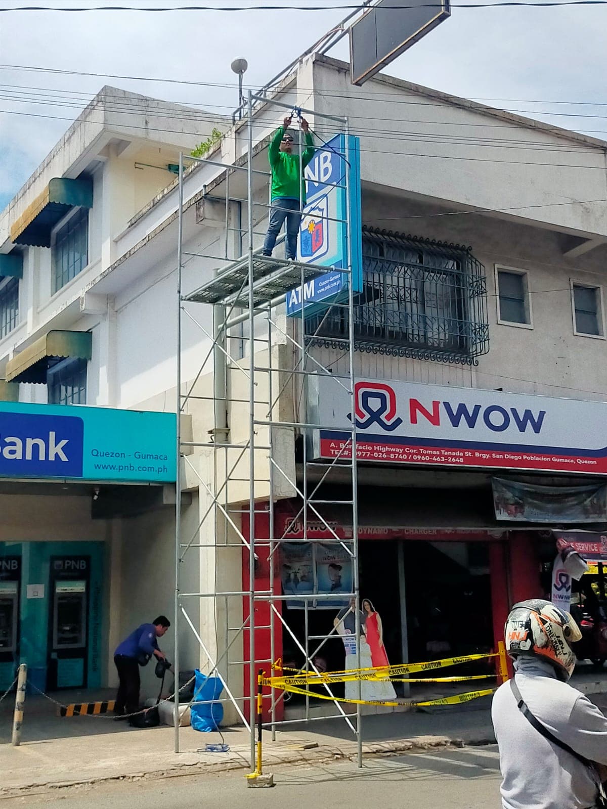 PNB ATM sign installation using scaffolding